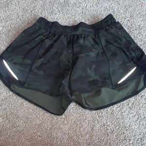 Green and black camo athletic shorts